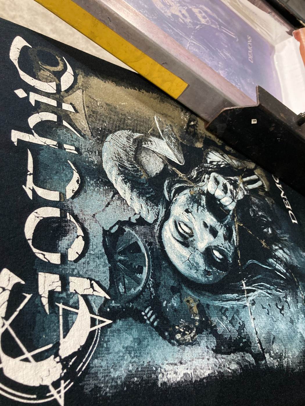 Detailed grayscale discharge print for custom metal band merchandise