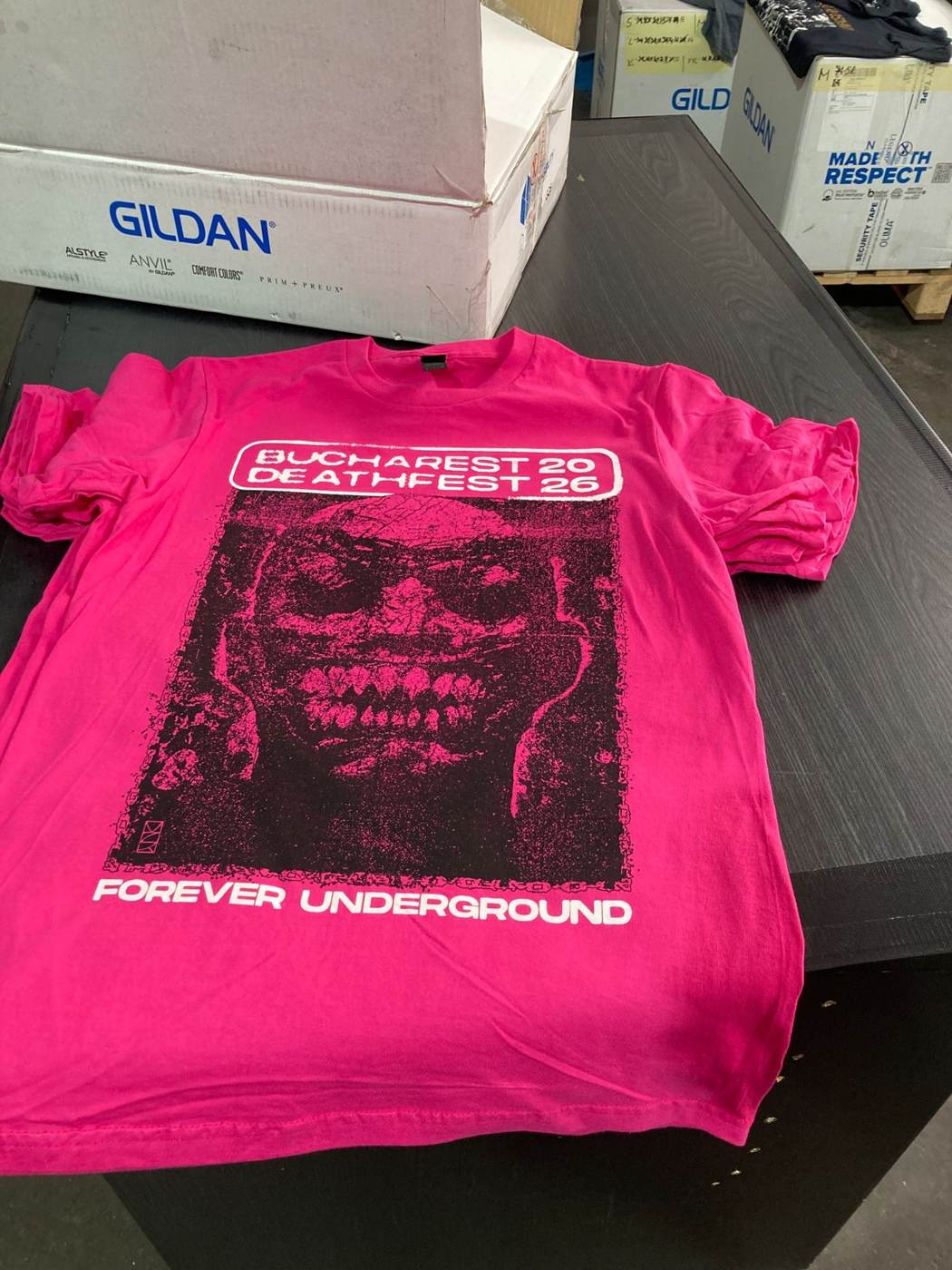 Pink custom screen printed T-shirts for underground band merchandise